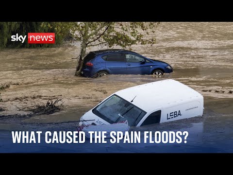 What caused the extreme weather that led to flooding in Spain?